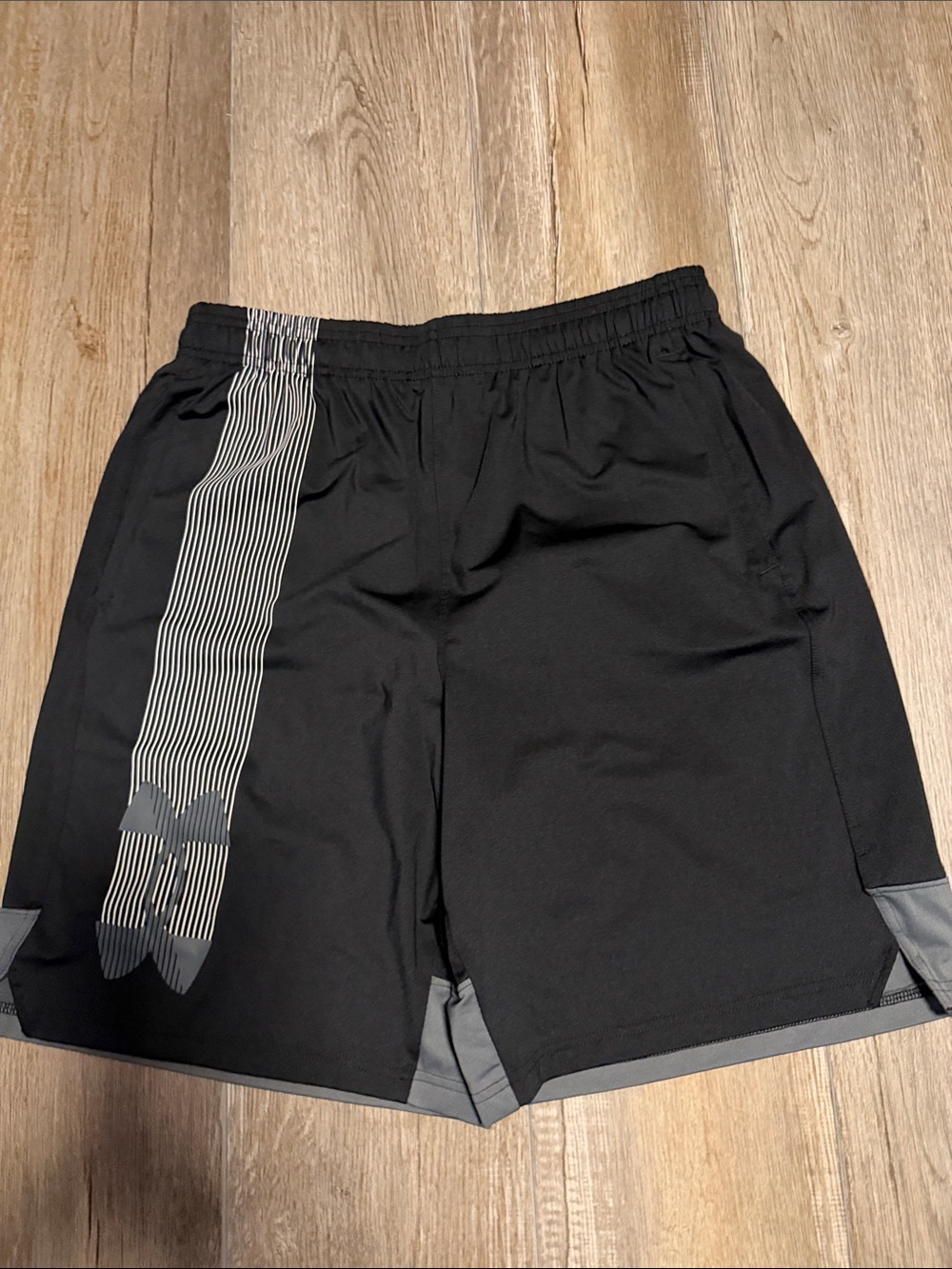 Under Armour Black Athletic Shorts with Gray Stripe Accent